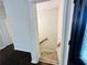 Front entry of home featuring open access to stairs and hardwood floors at 107 Oconnor Dr, Dallas, GA 30157