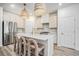 Contemporary kitchen with stainless steel appliances, a marble backsplash, and a large center island at 1704 Hyssop Se Blvd, Smyrna, GA 30126