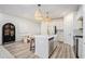 Contemporary kitchen with stainless steel appliances, a center island, and a dining area nearby at 1704 Hyssop Se Blvd, Smyrna, GA 30126