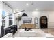 Stylish living room featuring modern furniture, a textured rug, and a large window at 1704 Hyssop Se Blvd, Smyrna, GA 30126