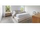 Bright main bedroom with a neutral color palette, comfortable bedding, and natural light at 1704 Hyssop Se Blvd, Smyrna, GA 30126