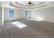 Spacious primary bedroom features a decorative ceiling and natural light at 2577 Ozella Sw Pl, Atlanta, GA 30331