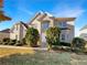 Attractive two-story home with manicured lawn and mature trees creating pleasing curb appeal at 2577 Ozella Sw Pl, Atlanta, GA 30331