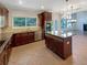 Bright kitchen features stainless appliances, granite countertops, kitchen island, and an open floor plan at 2577 Ozella Sw Pl, Atlanta, GA 30331