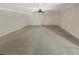 Spacious living room with carpet and ceiling fan at 2577 Ozella Sw Pl, Atlanta, GA 30331