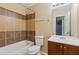 Well-maintained bathroom with a shower, tub, and a functional vanity area at 2907 Oakvale Falls Dr, Decatur, GA 30034