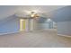 Large bonus room featuring neutral-colored walls and carpet flooring at 2907 Oakvale Falls Dr, Decatur, GA 30034