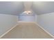 Bonus room showcasing the carpeted floors and neutral walls at 2907 Oakvale Falls Dr, Decatur, GA 30034
