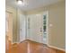 Inviting entryway with hardwood floors, white trim, and a view into other rooms at 2907 Oakvale Falls Dr, Decatur, GA 30034