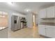 Kitchen with stainless steel appliances, and a view to the adjacent dining area at 2907 Oakvale Falls Dr, Decatur, GA 30034