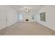 Living room features carpeted floors, a fireplace, and natural light from windows at 2907 Oakvale Falls Dr, Decatur, GA 30034