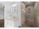 Bathroom with a walk-in shower with seat, tiled walls, and tiled floors, plus a modern sink and cabinets at 1686 Alvarado Sw Ter, Atlanta, GA 30310