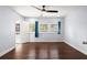 Bedroom with hardwood floors, natural light, and an ensuite bathroom at 1686 Alvarado Sw Ter, Atlanta, GA 30310