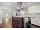 Kitchen featuring a center island, stainless steel appliances, and sleek finishes at 1686 Alvarado Sw Ter, Atlanta, GA 30310