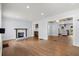 Spacious living room featuring hardwood floors and a cozy fireplace at 1686 Alvarado Sw Ter, Atlanta, GA 30310