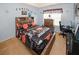 Bedroom with sports-themed decor, basketball bedding, and a study area with a computer at 1801 Deer Crossing Cir, Jonesboro, GA 30236