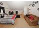 Large bedroom provides ample space for sleeping, seating, and working at 1801 Deer Crossing Cir, Jonesboro, GA 30236