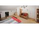 Spacious bedroom with a bed, seating area, and ample space at 1801 Deer Crossing Cir, Jonesboro, GA 30236