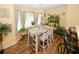Cozy breakfast nook with ample natural light, a small table, and comfortable barstool seating nearby at 1801 Deer Crossing Cir, Jonesboro, GA 30236