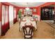Spacious formal dining room with chandelier, decorative furniture and abundant natural light at 1801 Deer Crossing Cir, Jonesboro, GA 30236