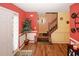 Inviting entryway features wood floors and stairway at 1801 Deer Crossing Cir, Jonesboro, GA 30236