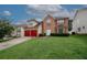 Attractive brick front home with a two-car garage, mature landscaping, and a well-kept lawn at 1801 Deer Crossing Cir, Jonesboro, GA 30236