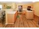 Bright kitchen with stainless steel appliances, center island and ample counter space at 1801 Deer Crossing Cir, Jonesboro, GA 30236