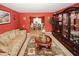 Cozy living room area featuring stylish sofas and a view into the dining area at 1801 Deer Crossing Cir, Jonesboro, GA 30236