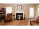 Relaxing living room with fireplace and hardwood floors at 1801 Deer Crossing Cir, Jonesboro, GA 30236