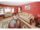 Cozy living room space featuring plush sofas and elegant furnishings at 1801 Deer Crossing Cir, Jonesboro, GA 30236