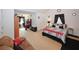 Comfortable main bedroom featuring a seating area and a walk-in closet at 1801 Deer Crossing Cir, Jonesboro, GA 30236