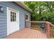 Cozy back deck featuring a convenient door, ideal for enjoying quiet moments outdoors at 3111 Jones St, East Point, GA 30344