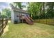 Charming backyard with a deck, offering space for outdoor entertainment and leisure at 3111 Jones St, East Point, GA 30344