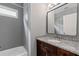 Modern bathroom featuring a vanity with stone countertop, shower and tub combo, providing a great space at 3111 Jones St, East Point, GA 30344
