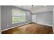 Large, bright room with hardwood flooring and natural light at 3111 Jones St, East Point, GA 30344