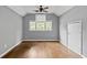 Spacious bedroom with hardwood floors, large windows, and vaulted ceilings at 3111 Jones St, East Point, GA 30344