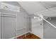 Walk-in closet with metal shelving and hardwood floors at 3111 Jones St, East Point, GA 30344