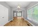 Bright living room features hardwood floors, natural light and an open-concept design at 3111 Jones St, East Point, GA 30344