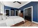 Spacious bedroom with doors leading to multiple rooms and dark doors at 57 Forsyth Nw St # 11G, Atlanta, GA 30303