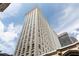 Architectural shot of tall building against blue sky at 57 Forsyth Nw St # 11G, Atlanta, GA 30303