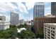 An urban view of the surrounding high-rise buildings shows the bustling city environment with a partly cloudy sky at 57 Forsyth Nw St # 11G, Atlanta, GA 30303