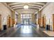 Wide view of building lobby with marble floors and elevators at 57 Forsyth Nw St # 11G, Atlanta, GA 30303