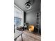 Sunlit office space features modern furnishings and a ladder at 57 Forsyth Nw St # 11G, Atlanta, GA 30303