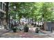 Inviting outdoor space with planters, seating, and greenery at 57 Forsyth Nw St # 11G, Atlanta, GA 30303