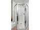 Updated shower features glass door, tile surround, and modern fixtures at 57 Forsyth Nw St # 11G, Atlanta, GA 30303