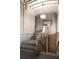 Classic staircase with stone steps, brass handrails, and stylish lighting at 57 Forsyth Nw St # 11G, Atlanta, GA 30303