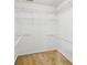Walk-in closet with wire shelving, providing ample storage space at 111 Trellis Ct, Acworth, GA 30101