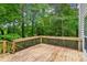 Outdoor deck overlooking wooded backyard at 111 Trellis Ct, Acworth, GA 30101