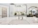 Close-up of the kitchen island with white marble countertops and stainless steel faucet at 270 Morrow Rd, Newborn, GA 30056