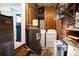 View of basement laundry area featuring washer, dryer, and water heater at 361 N Dogwood N Ave, Social Circle, GA 30025